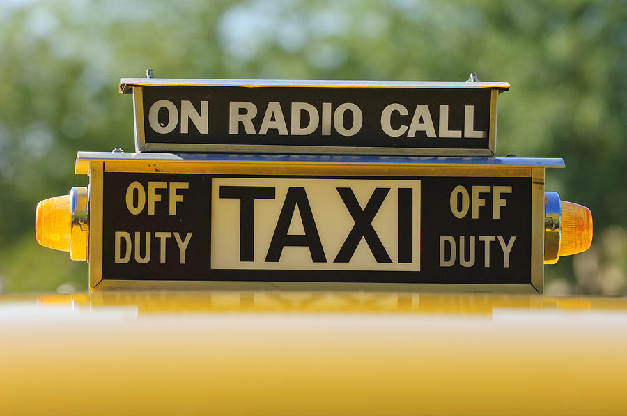 Checker Taxi Cab Duty Sign Photograph by Jill Reger