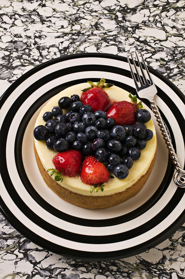 Cheese cake on black and white plate Photograph by Garry Gay