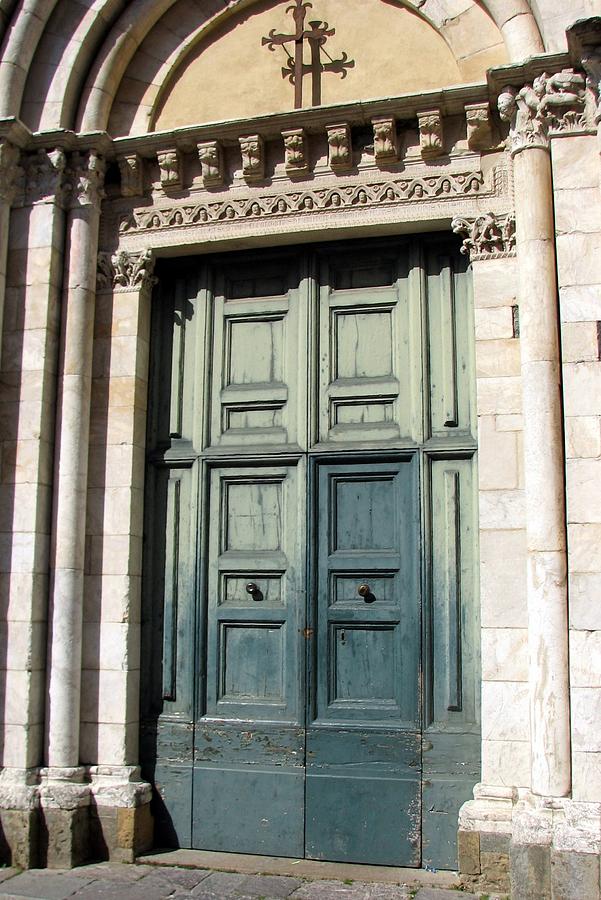 Church Door in Volterra Photograph by Carla Parris