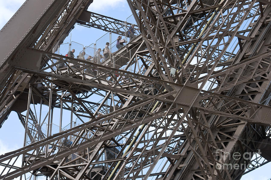 Climbing up the Eiffel Tower Photograph by Fabrizio Ruggeri
