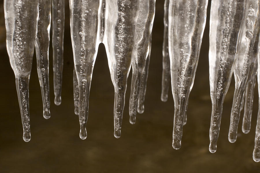 Closeup Of Icicles Hanging From An Ice Photograph by Phil Schermeister