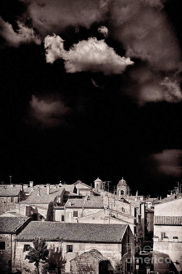 Cloud over Tuscania village - Italy Photograph by Silvia Ganora