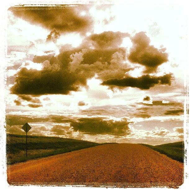 Clouds Photograph - #clouds #northdakota #road#gravel by Emily Nielsen