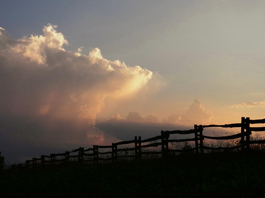 Clouds Over Fence Photograph by Joyce Kimble Smith