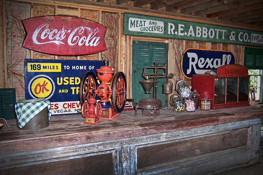 Coca Cola - Rexall - OK Used Tires Signs and Other Antiques Photograph by Kathy Clark