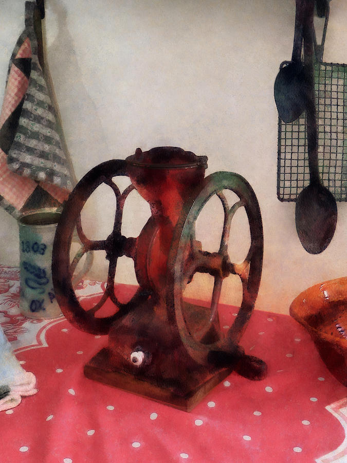 Coffee Grinder on Red Tablecloth Photograph by Susan Savad