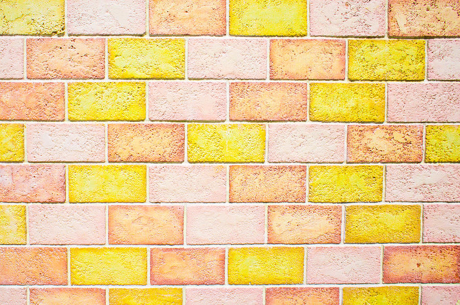 Architecture Photograph - Colorful brick wall by Tom Gowanlock