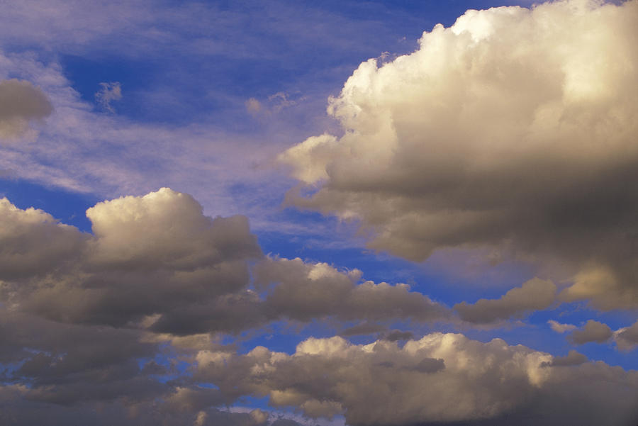 Colorful Clouds Against Blue Sky New Photograph by Tim Fitzharris