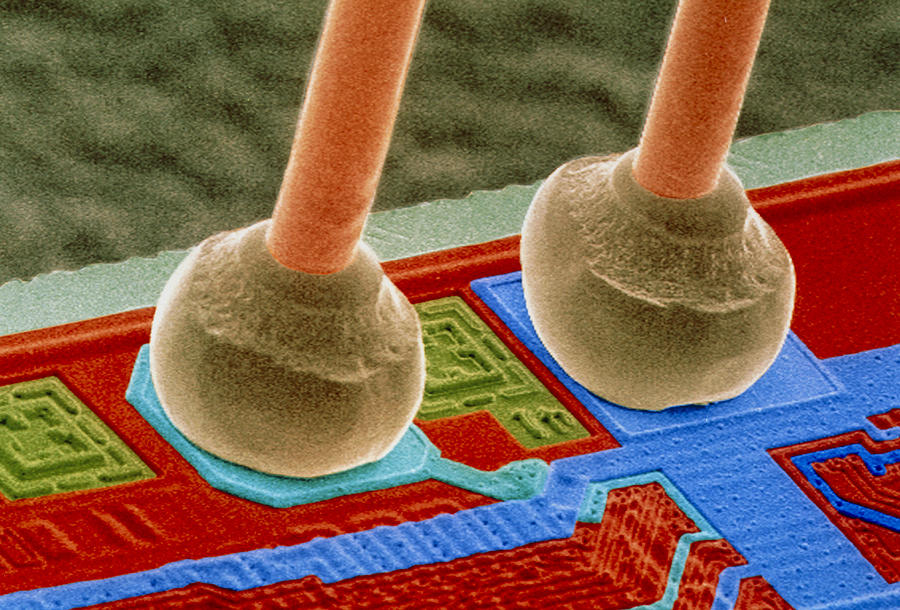 Silicon Chip Photograph - Coloured Sem Of Integrated Circuit Micro-wires. by Power And Syred