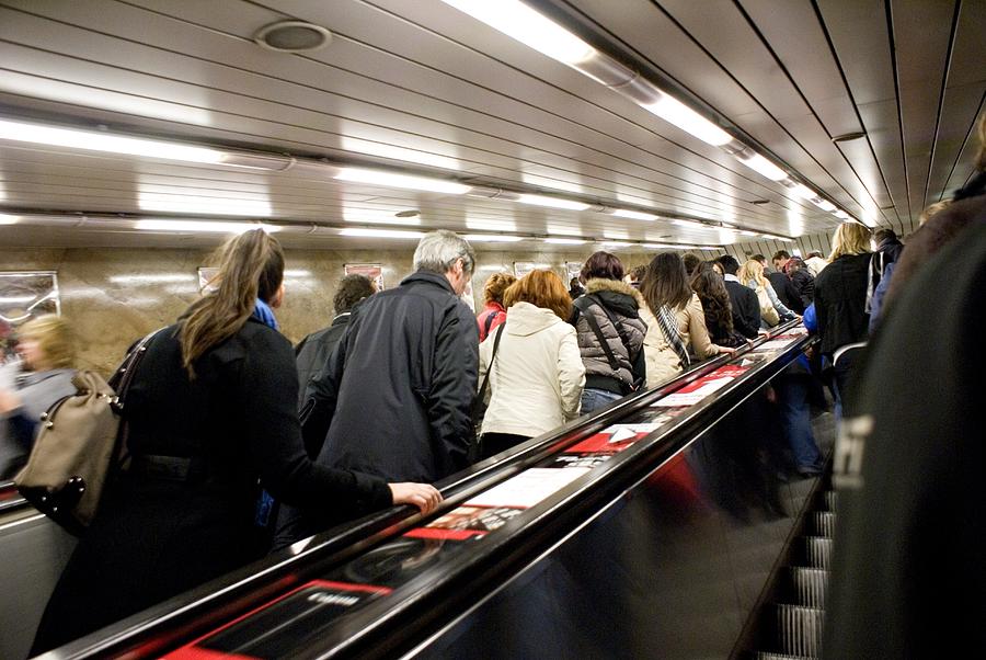 Commuters On Escalators In Prague Metro Photograph by Mark Williamson