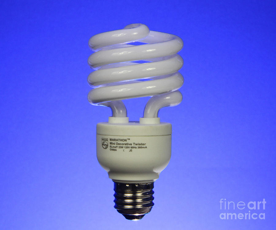 Compact Fluorescent Light Bulb Photograph by Photo Researchers, Inc.