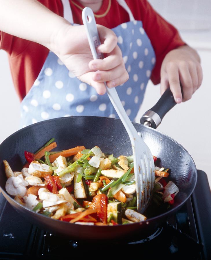 Cooking A Stir Fry Photograph by Veronique Leplat - Fine Art America