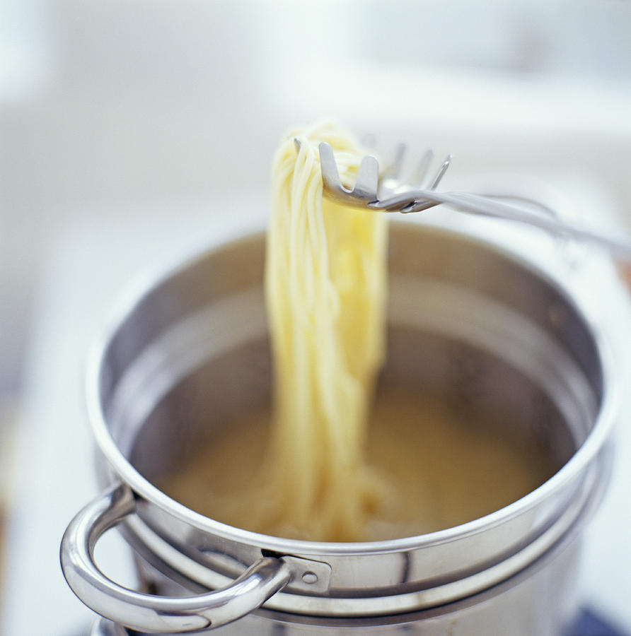 Pan Photograph - Cooking Spaghetti by David Munns