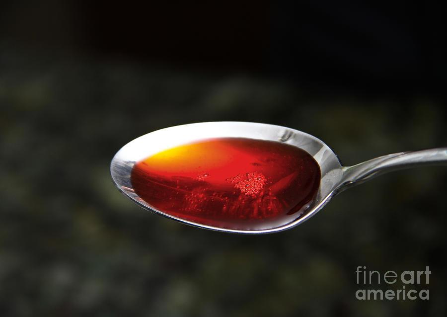 Cough Medicine In Spoon Photograph by Photo Researchers, Inc.