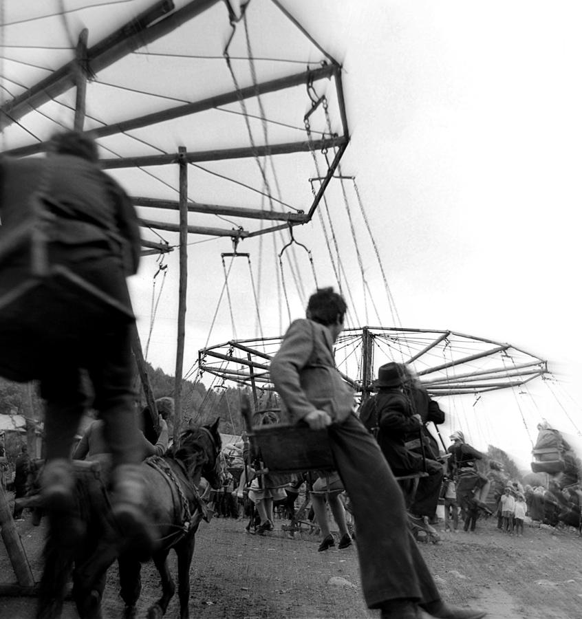 Country fair swings Photograph by Emanuel Tanjala