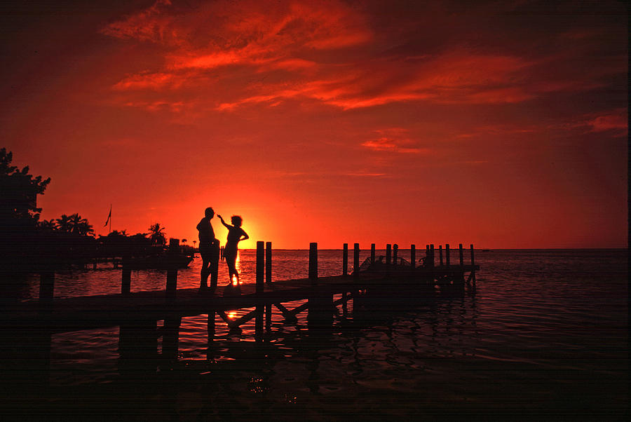 Couple at Sunset Photograph by Larry Mulvehill
