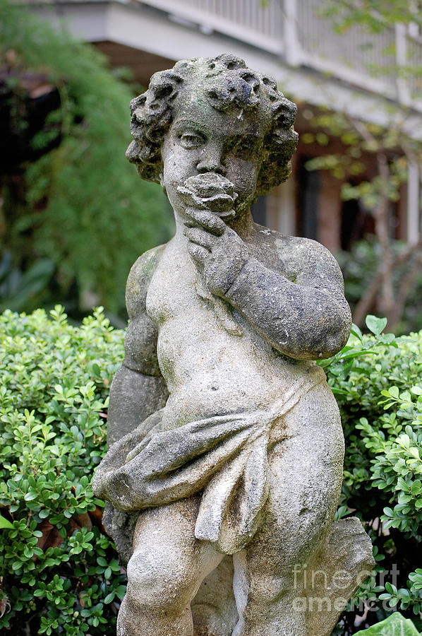 Courtyard Statue of a Cherub Smelling a Rose French Quarter New Orleans  Photograph by Shawn OBrien