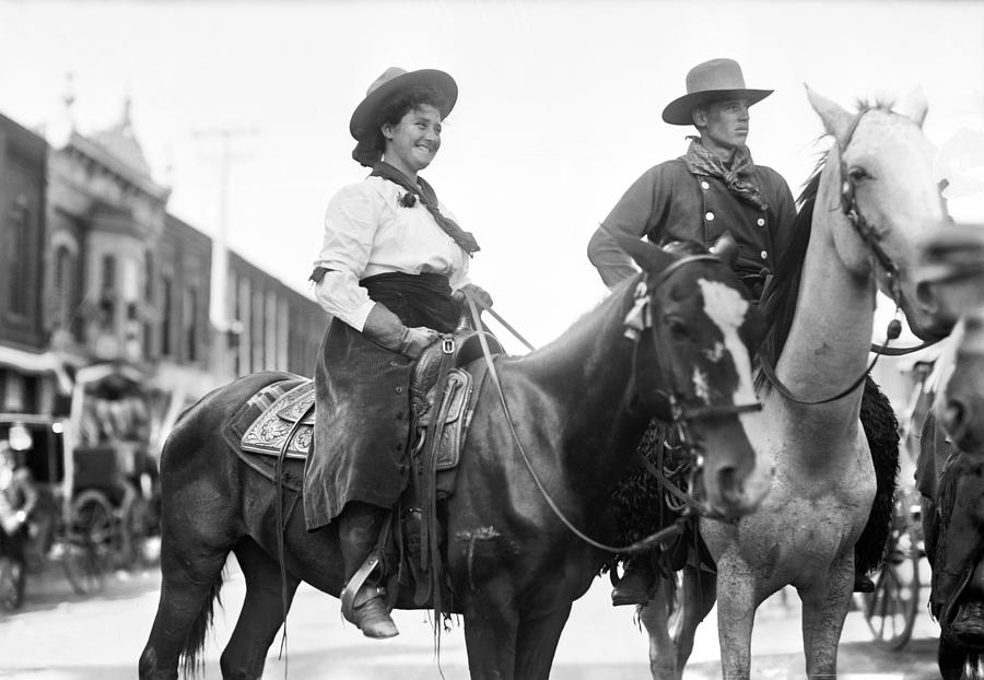 COWBOY AND COWGIRL, c1908 Photograph by Granger