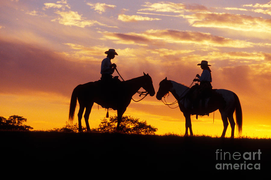 Sunset Photograph - Cowboy and Cowgirl by Ron Sanford and Photo Researchers