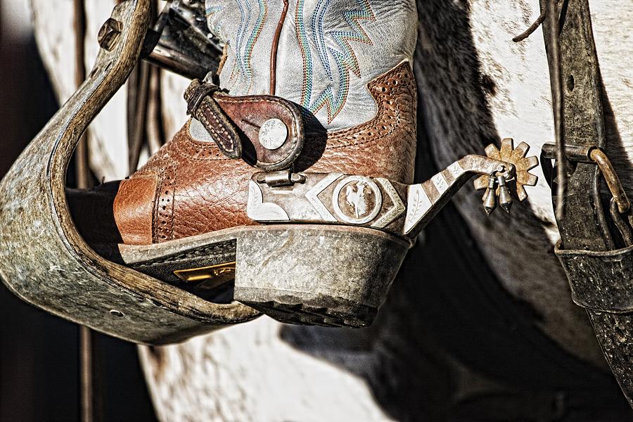 Cowboy Boot Heel And Spur In Saddle Photograph by Carson Ganci