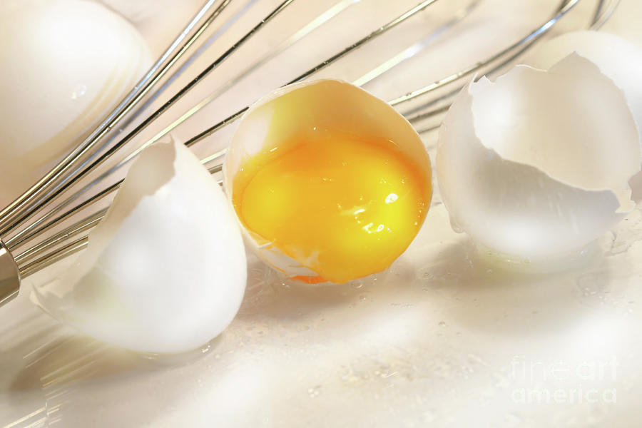 Cracked egg with yolk Photograph by Sandra Cunningham