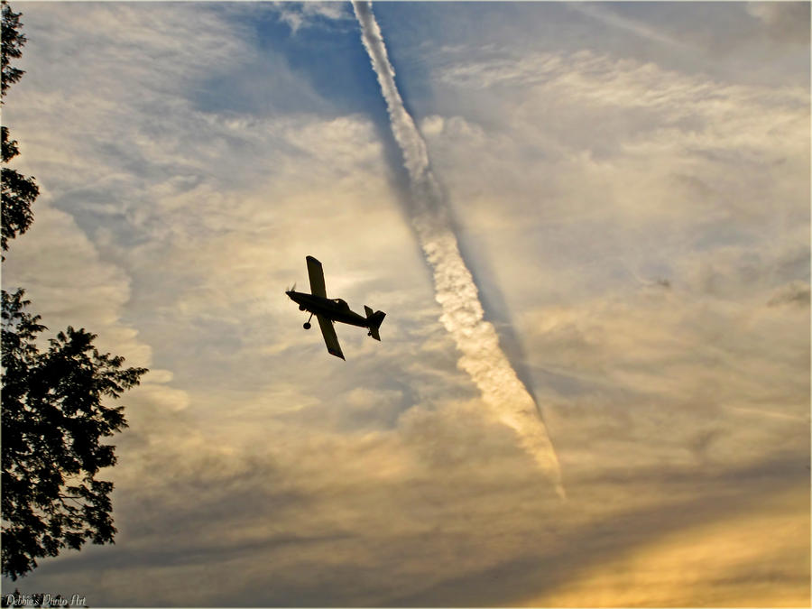 Crop Duster under the Jet trail Photograph by Debbie Portwood