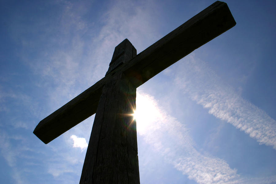 Cross and sunlight Photograph by Emanuel Tanjala