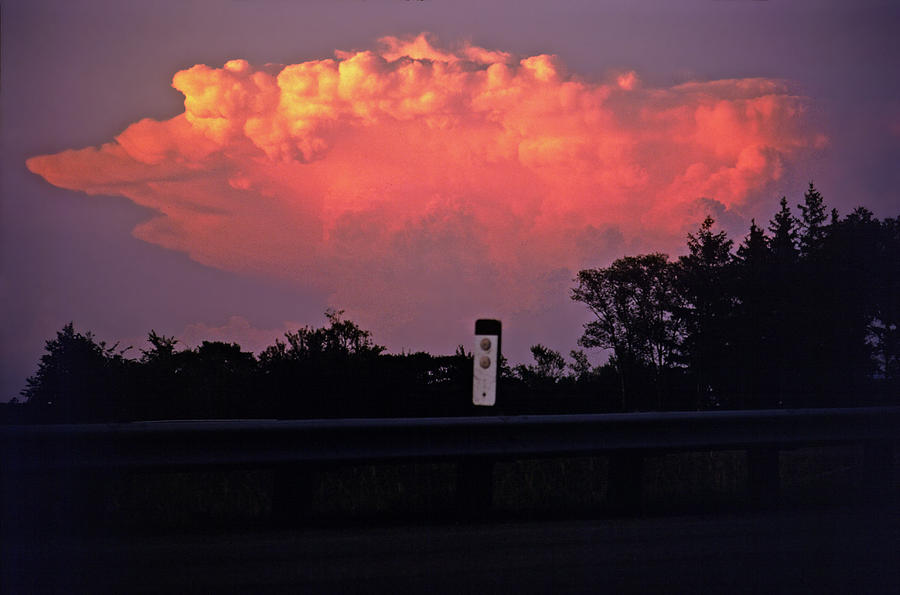 Cumulonimbus at sunset Photograph by Rod Jones