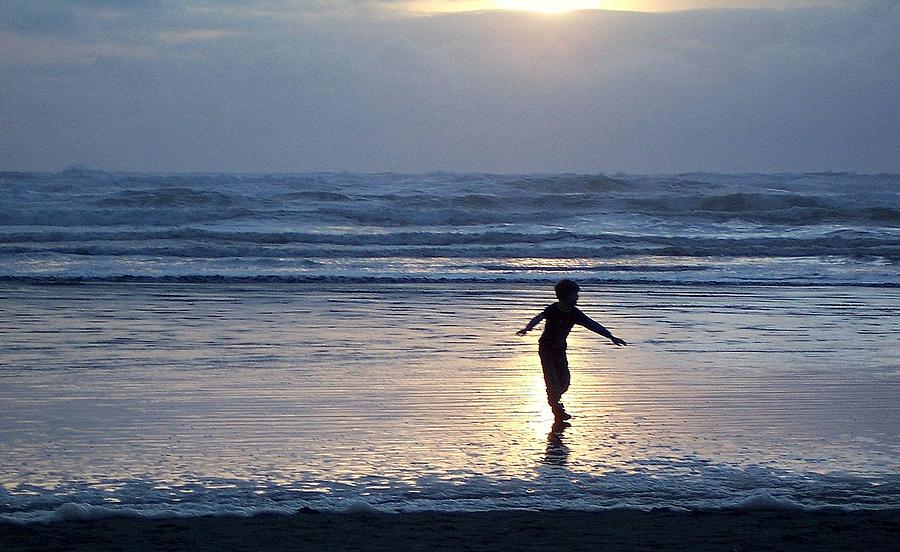 Dancing Boy at Sunset Photograph by Peter Mooyman