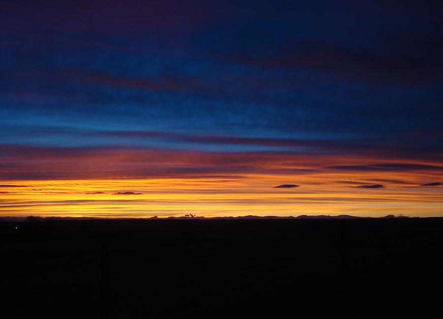 Sunset Photograph - Darkness falls across the land by Sandi Owens