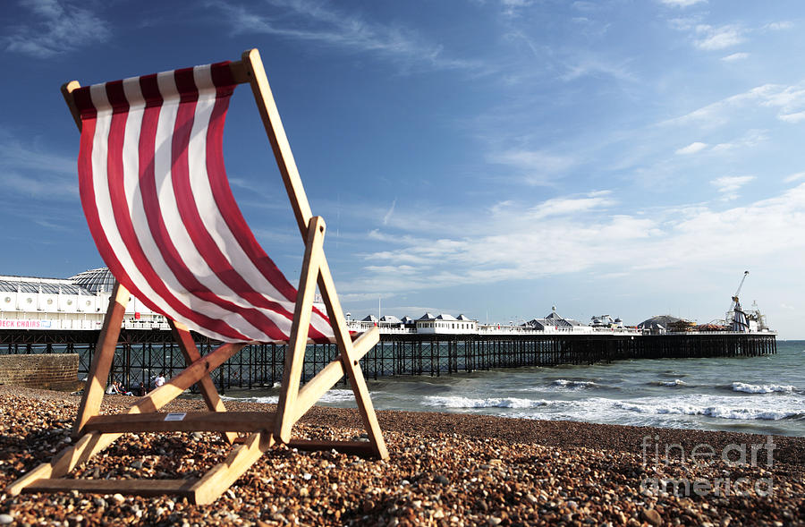 Beach Photograph - Deckchair on Brighton Beach by Neil Overy