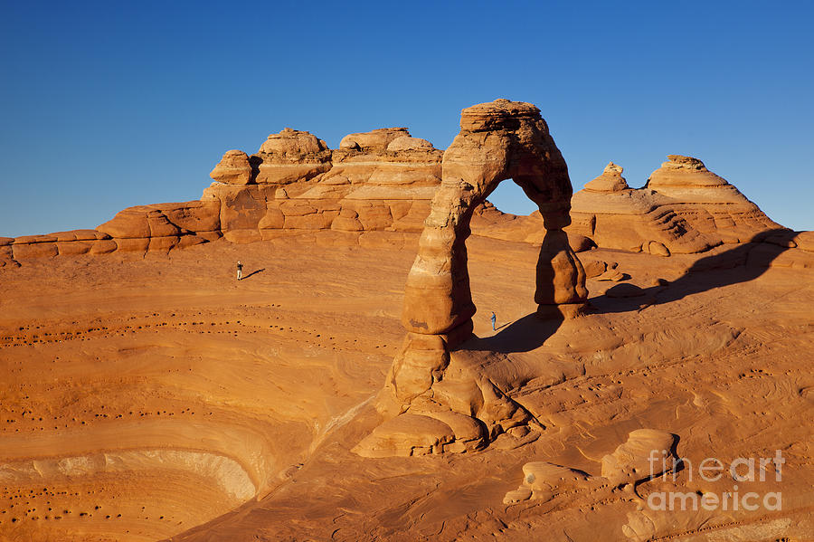 Delicate Arch at Sunset Photograph by Brian Jannsen