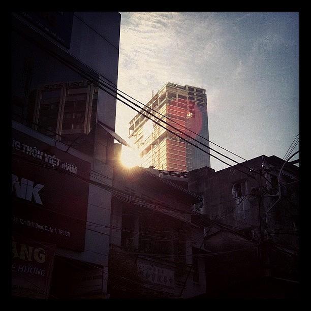 Vietnam Photograph - Di Celahan Bangunan - Sunrise by Fazwan Nordin