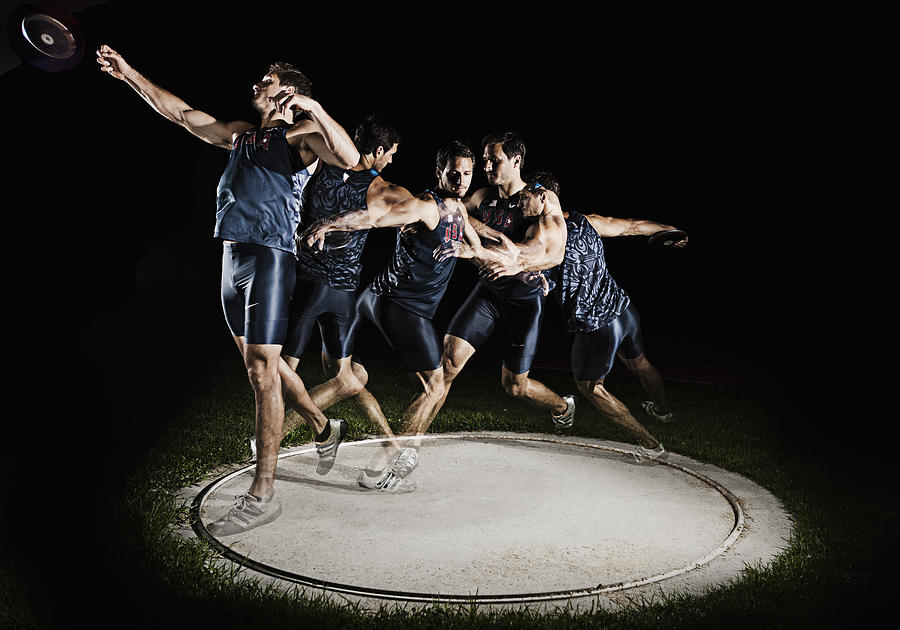 Athlete Photograph - Discus Thrower by Mike Raabe