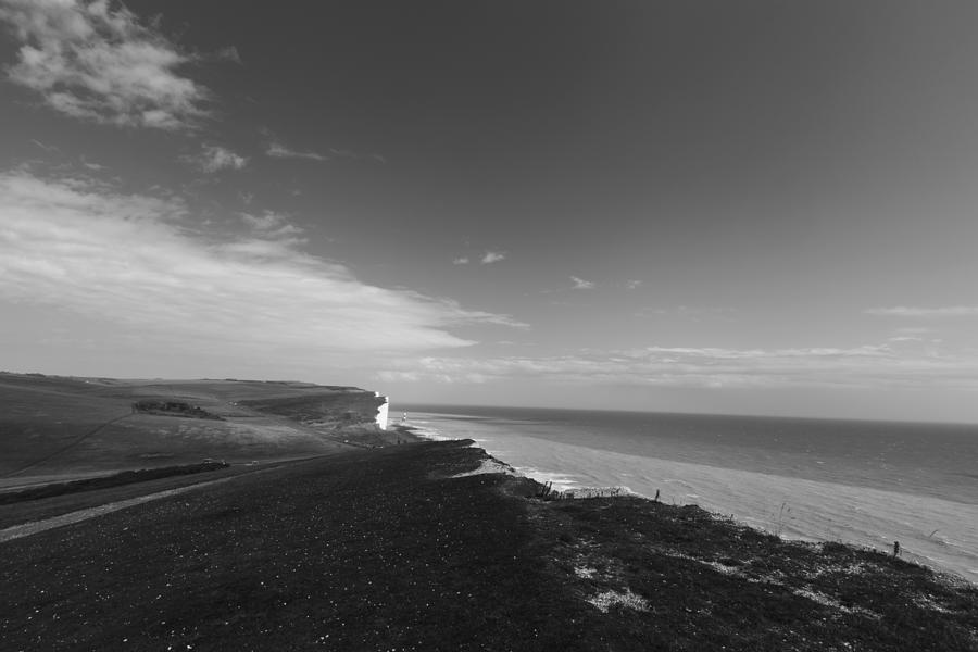 Distant Lighthouse Photograph by Maj Seda