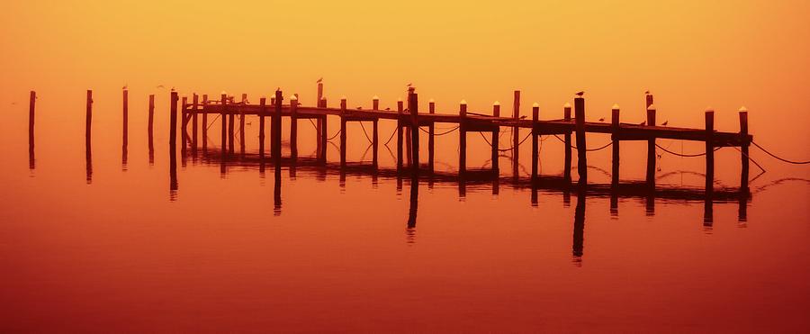Dock at Sunset Photograph by John Loreaux