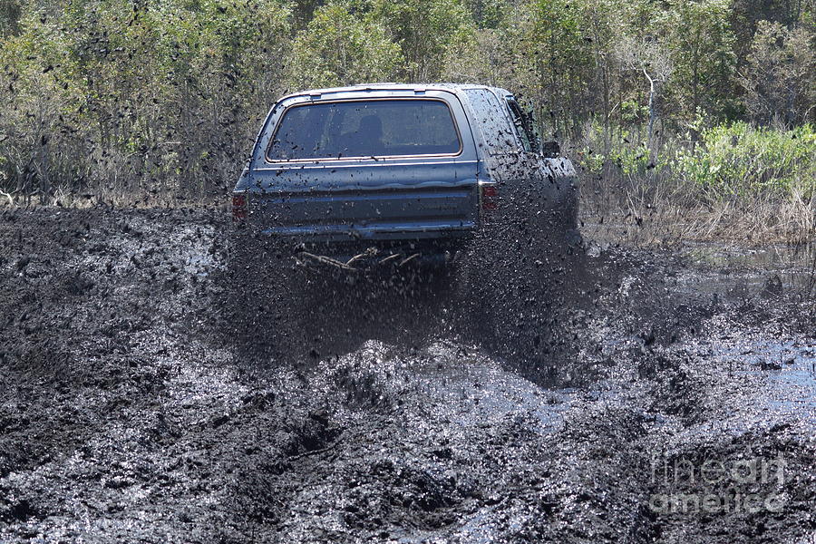 Dodge Ramcharger in Local Mud 2 Photograph by Lynda Dawson-Youngclaus