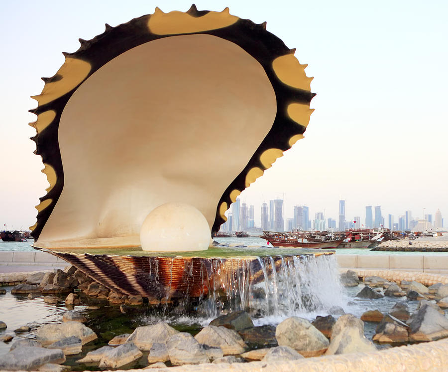 Doha fountain and dhows Photograph by Paul Cowan