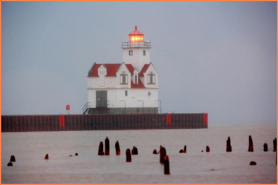 Winter Photograph - Door County Lighthouse on The Bay by Fuad Azmat