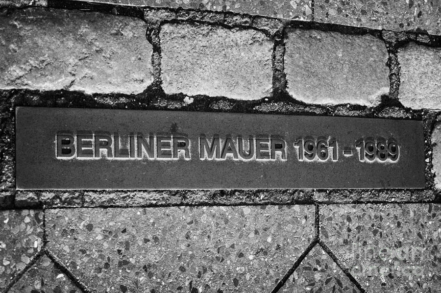 Berlin Photograph - double row of bricks across berlin to mark the position of the berlin wall berliner mauer Germany by Joe Fox