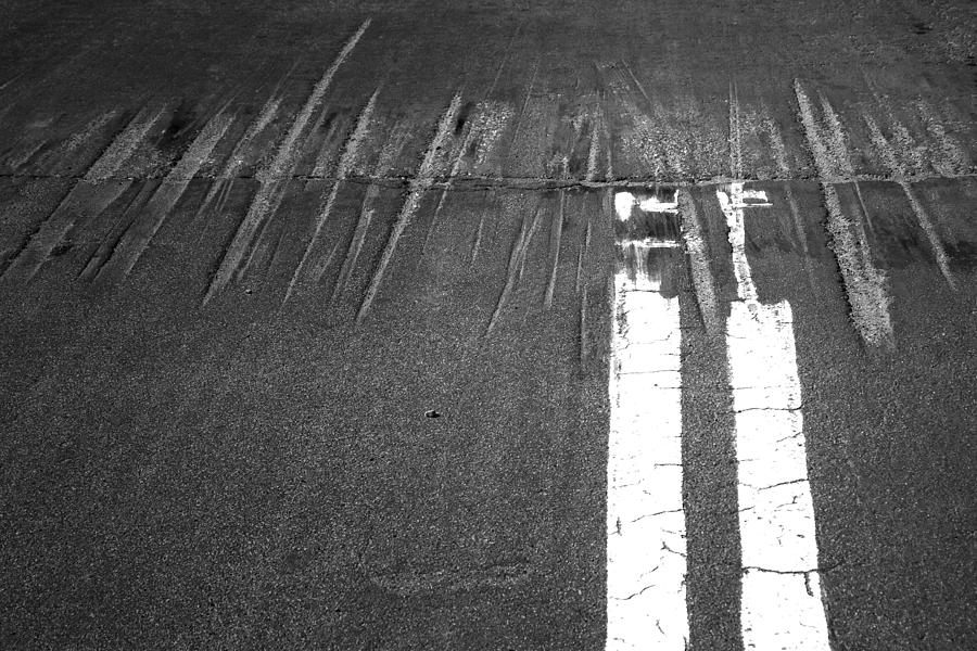 Abstract Photograph - Double Yellow Lines on a Road by Randall Nyhof