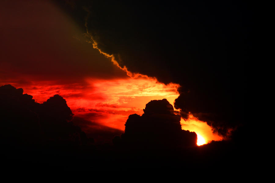 Dramatic sunset II Photograph by Emanuel Tanjala