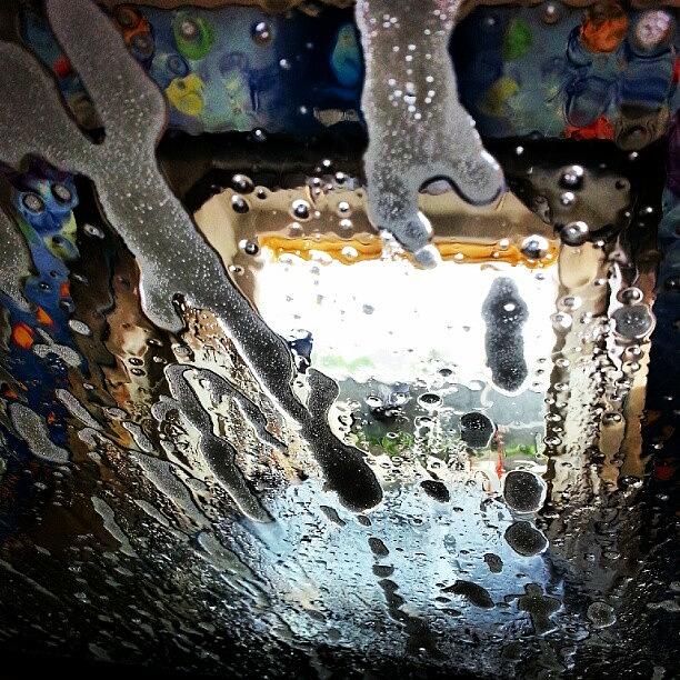 Instagrammers Photograph - Dropping Soap On The Window Glass by Tommy Tjahjono