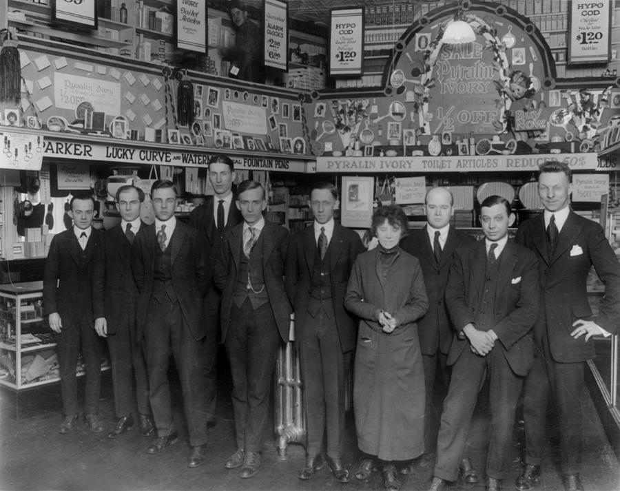 Drug Store, Nine Men And A Woman Posed Photograph by Everett