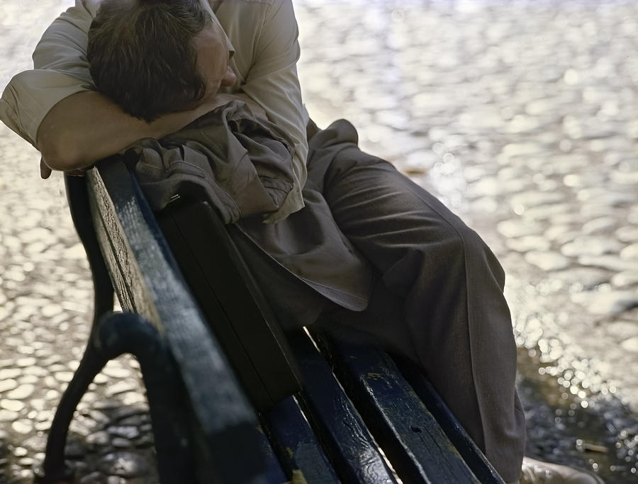 Drunken man sleeping on a blue bench Photograph by Juan Carlos Ferro Duque