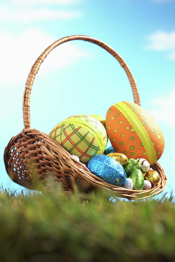 Easter Eggs In Basket On Grass, Ground View Photograph by Martin Poole