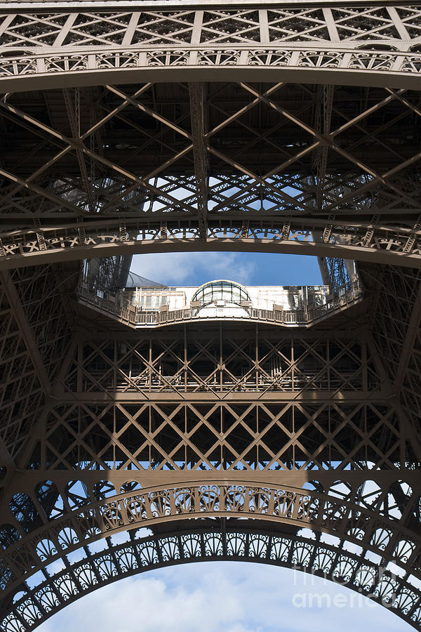 Eiffel tower first platform from below Photograph by Fabrizio Ruggeri