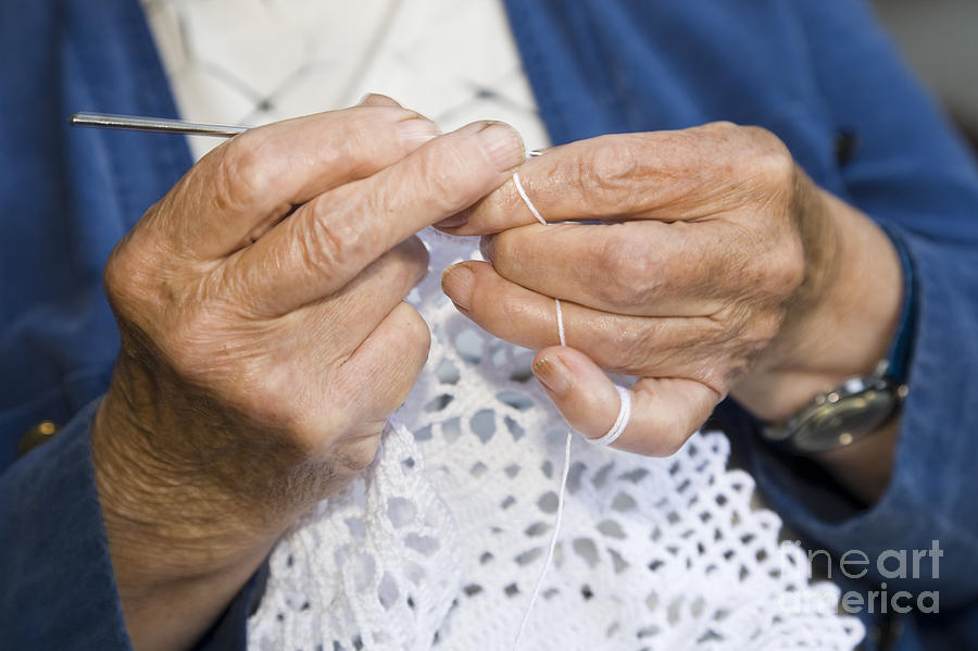 Elderly woman crocheting Photograph by Kathleen Smith | Fine Art America