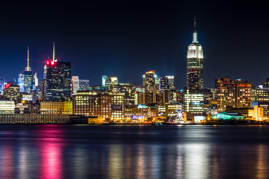 Empire State Building and Midtown manhattan at Night Photograph by Val Black Russian Tourchin