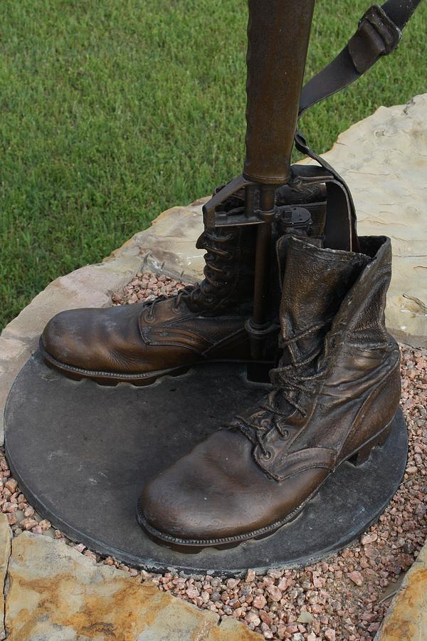 Empty Boots Photograph by Johns Pixels